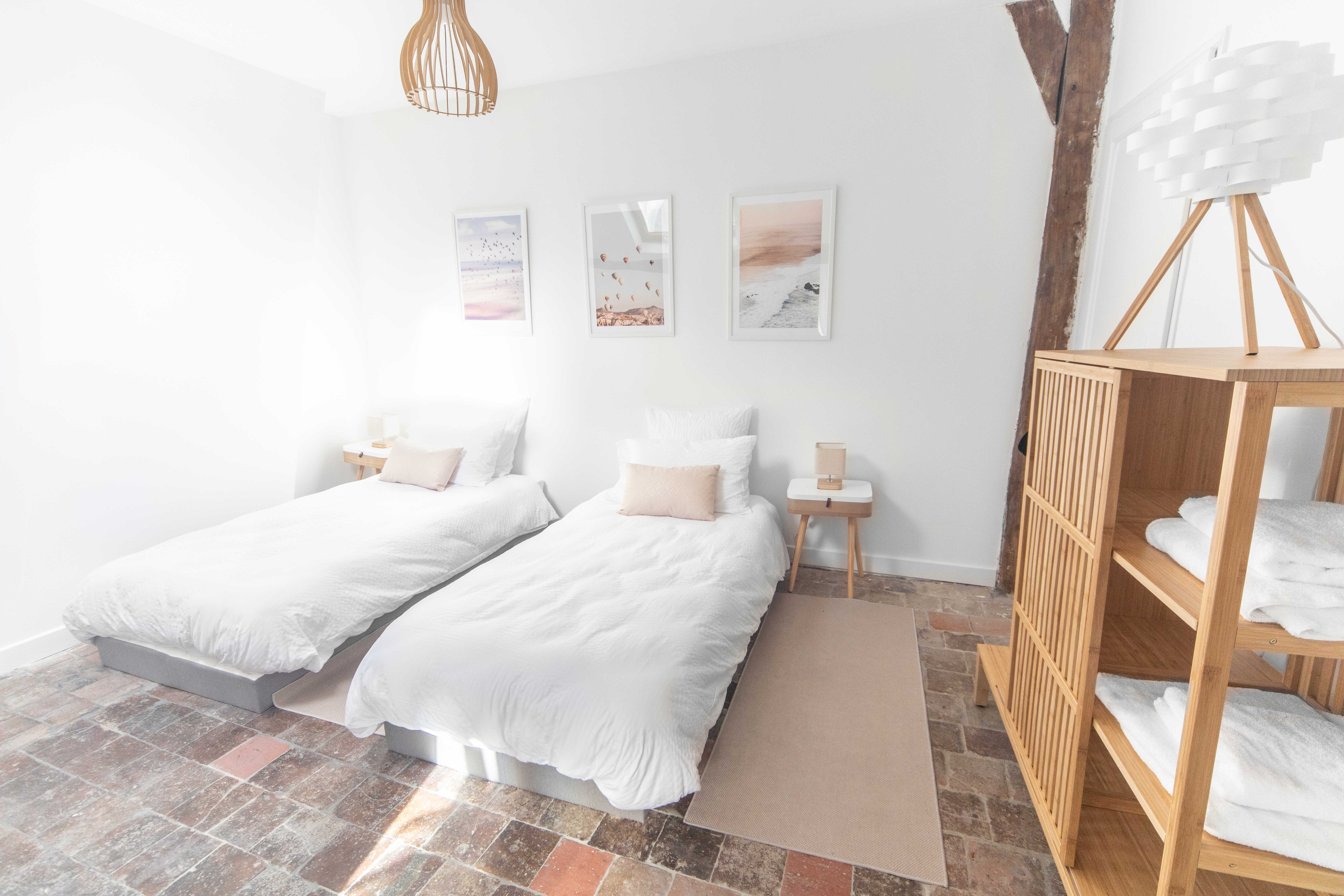 A bedroom with single beds