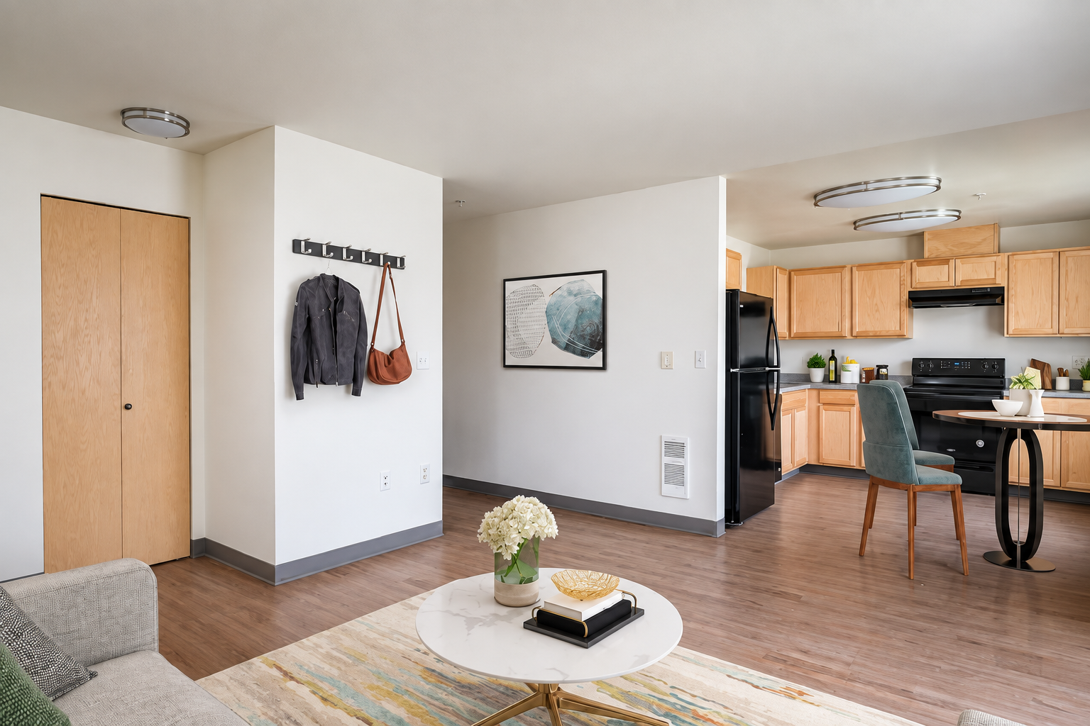 Furnished living room and view of kitchen