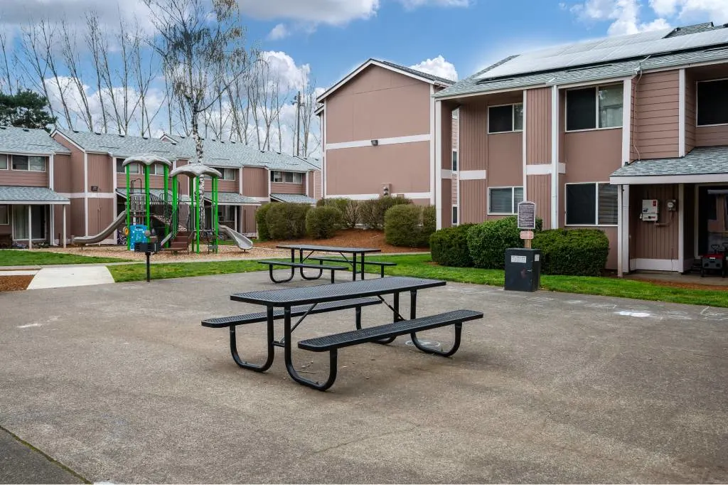 Exterior community area with picnic table