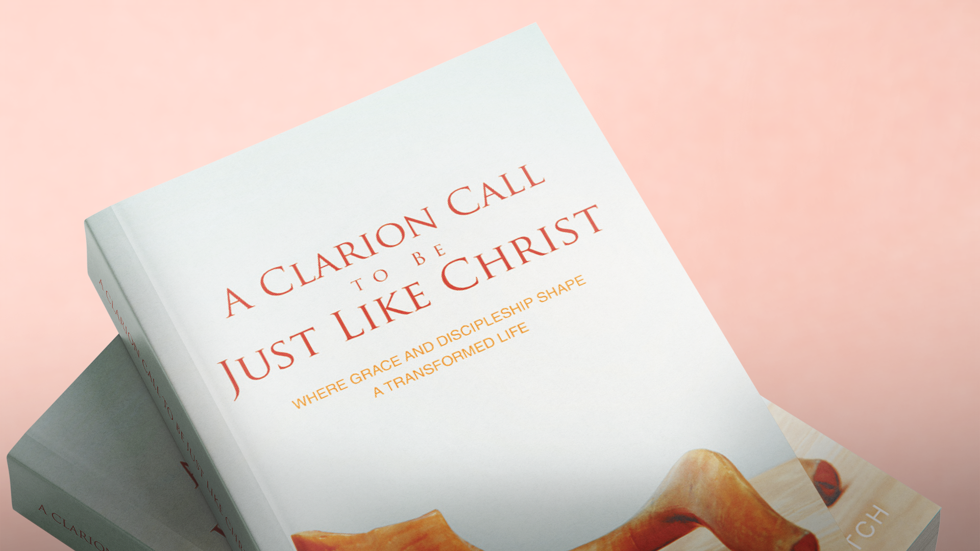 Close-up of the cover of A Clarion Call to Be Just Like Christ on a pink background