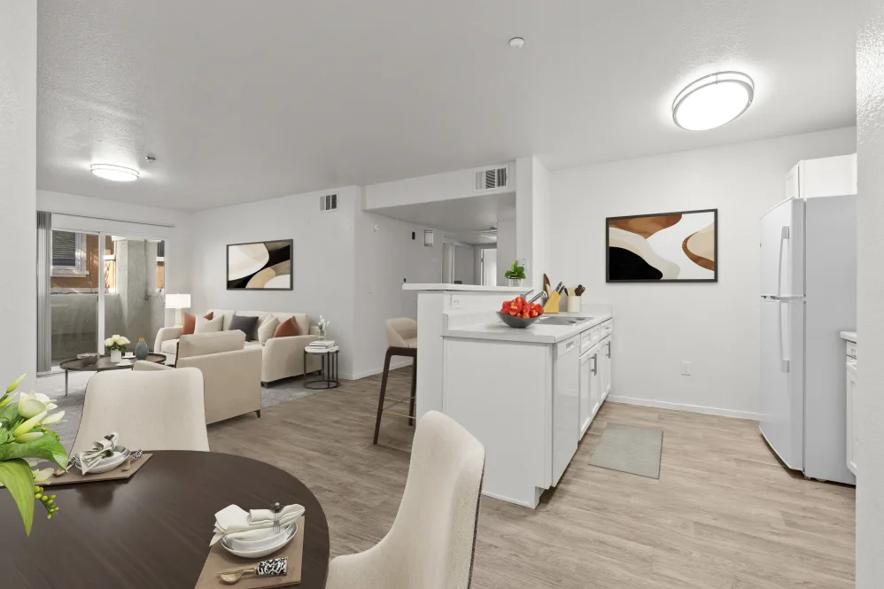 Furnished living room, dining room, and kitchen