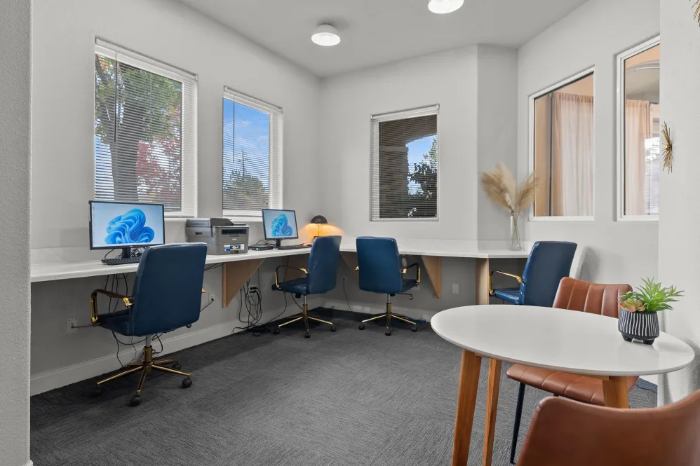 Business center with computers and desks