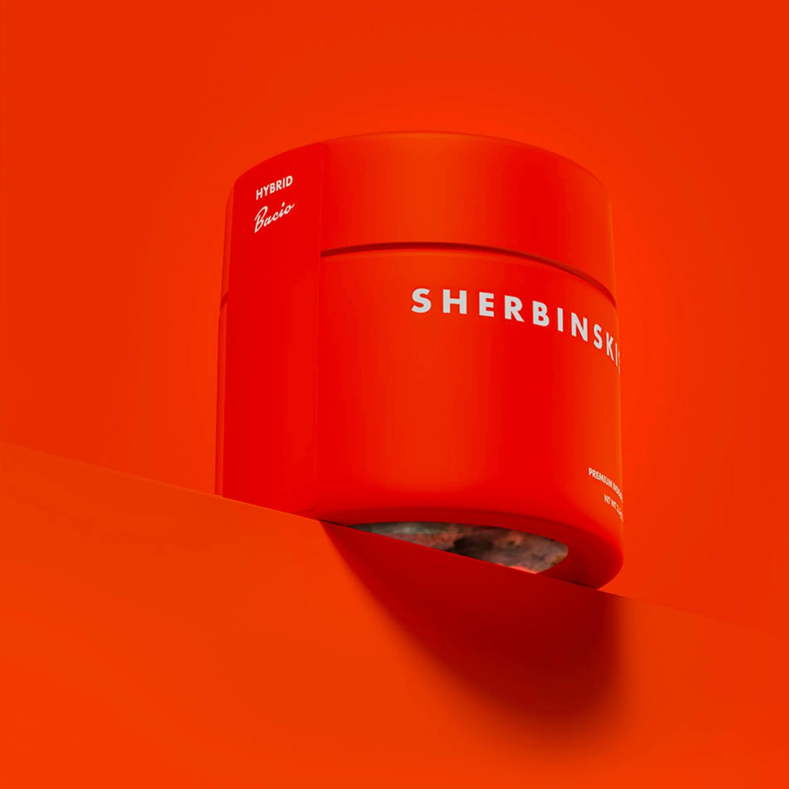Sherbinskis flower in an orange glass jar