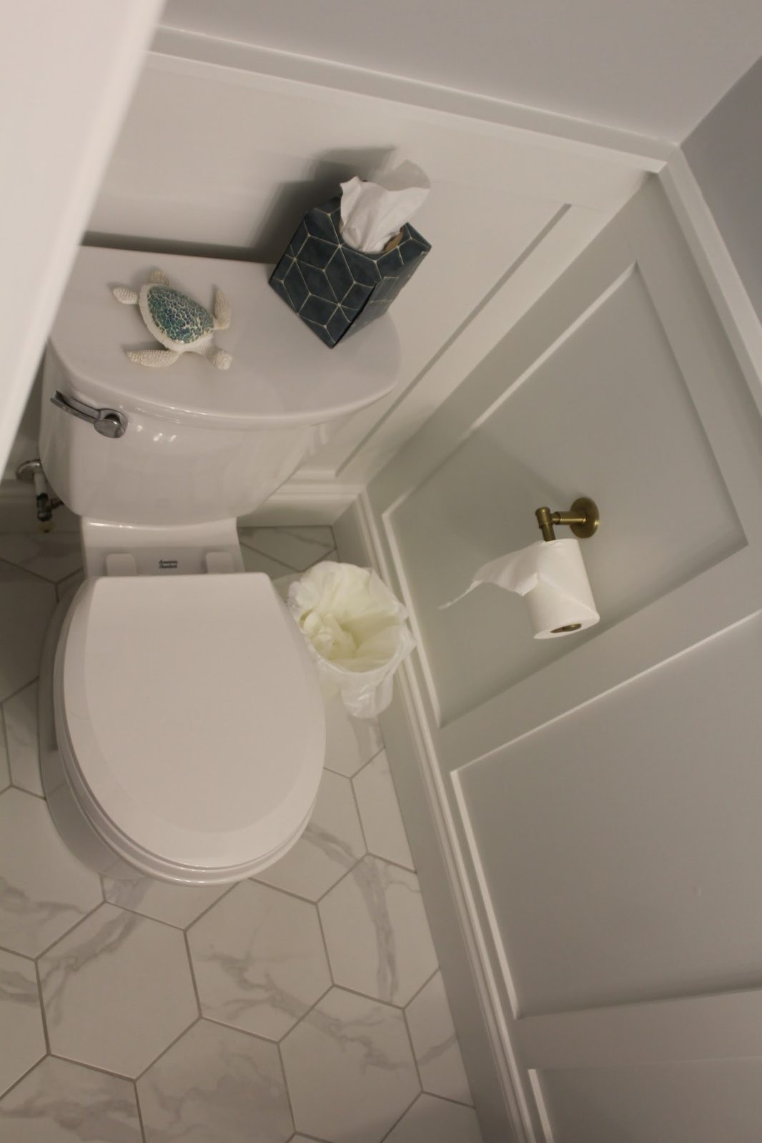 Hershey powder room tile floor and wainscoting