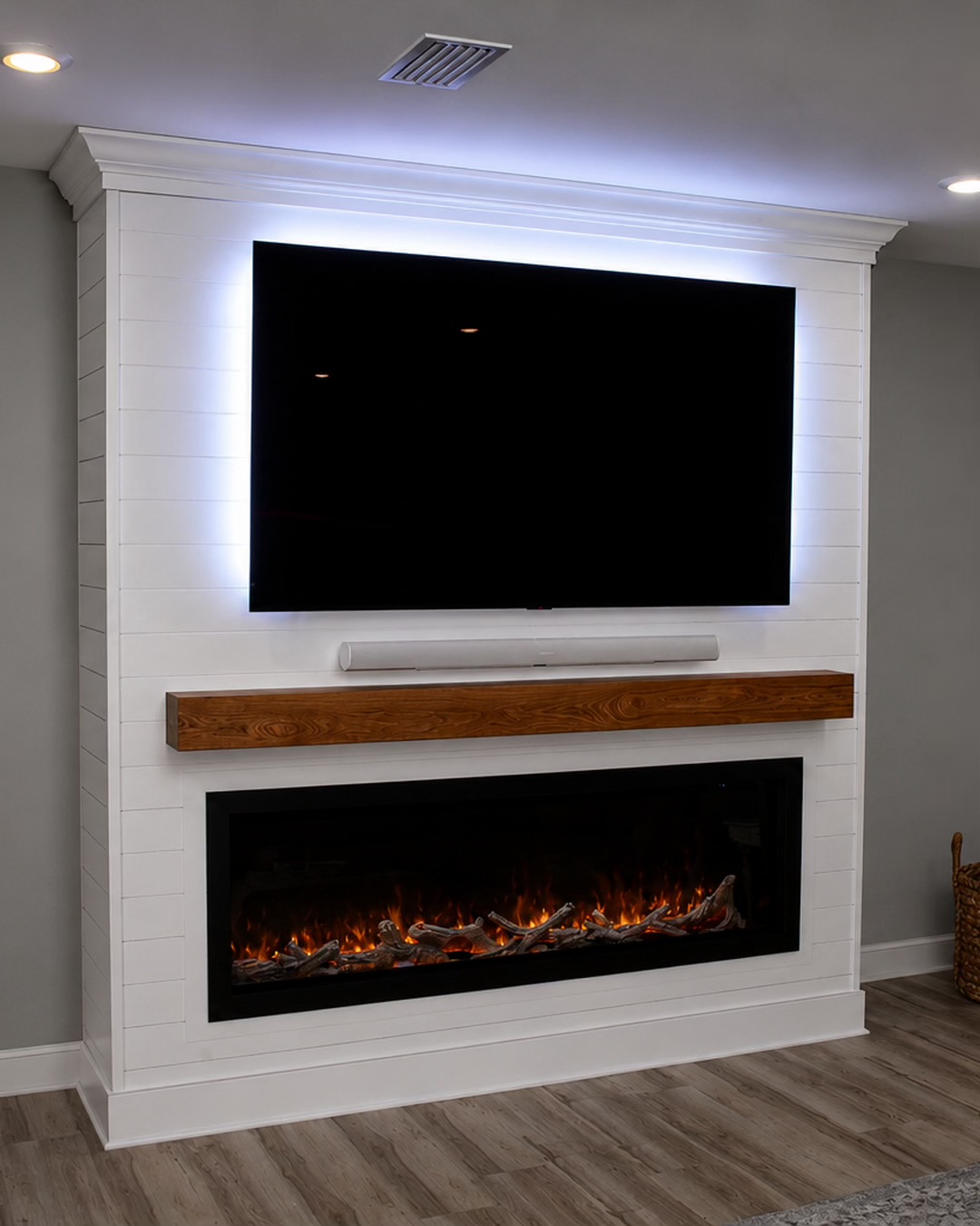 Custom built-in with backlit TV at night