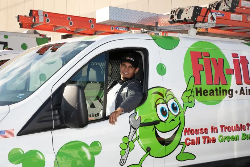 A technician in a Fix-it truck.