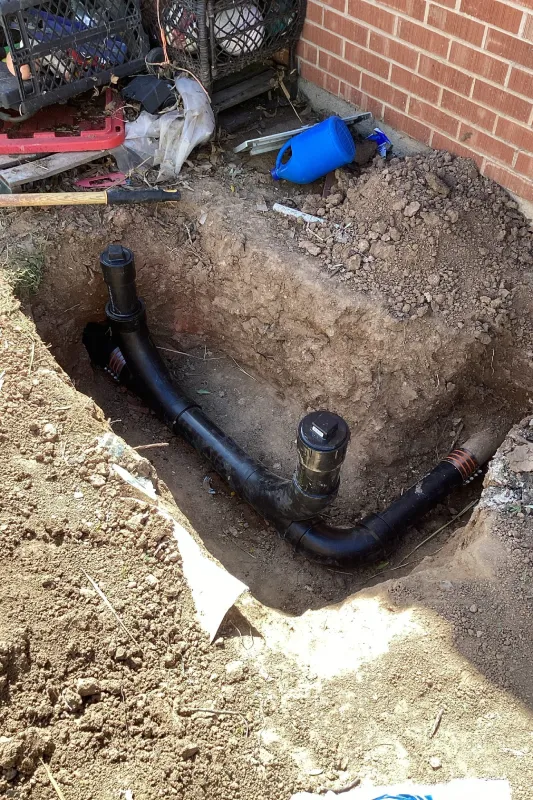 Sewer pipes in the ground.