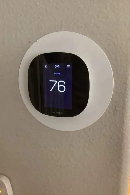 A thermostat in a customer's house.