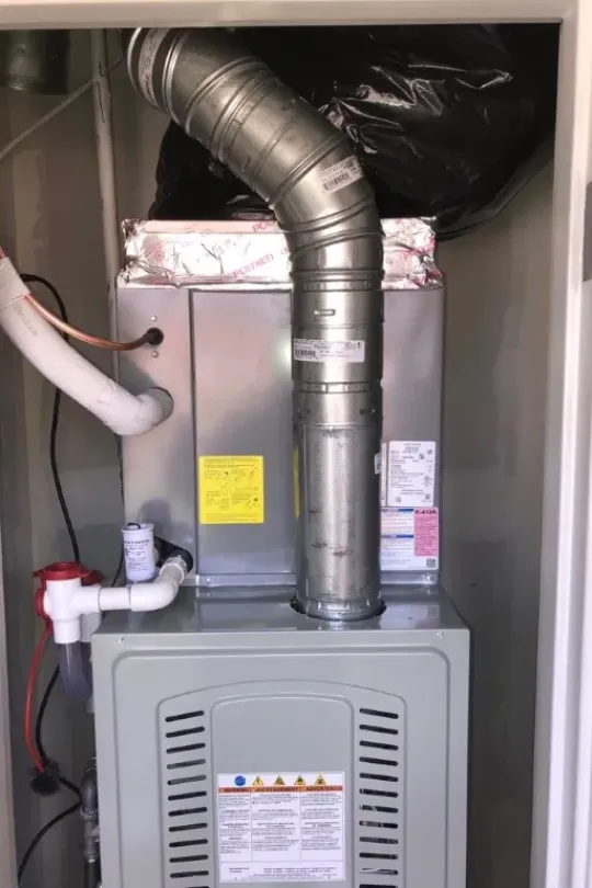 A picture of a furnace in a customer's house.