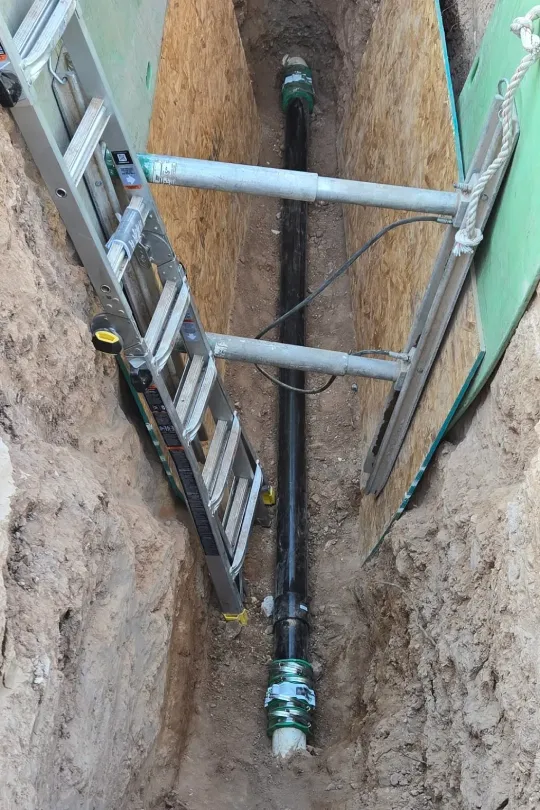 A sewer line in the ground.
