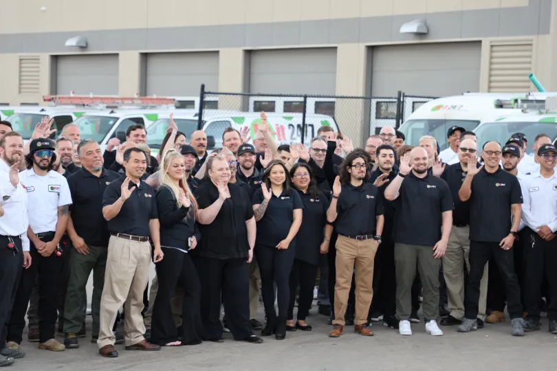 A group photo of the people who work at the Denver Fix-it 24/7 location
