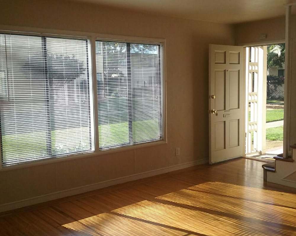 Common space with windows and door
