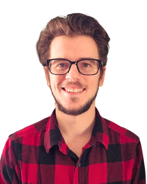 Headshot of a smiling Student Loan Tutor team member wearing glasses and a red plaid shirt.
