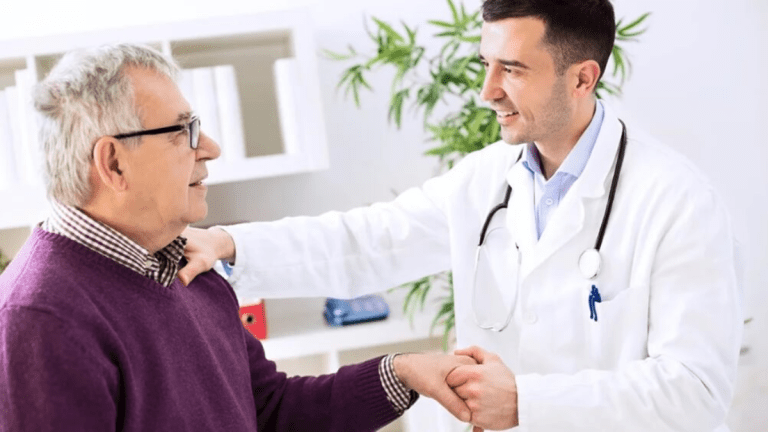 chiropractor with patient