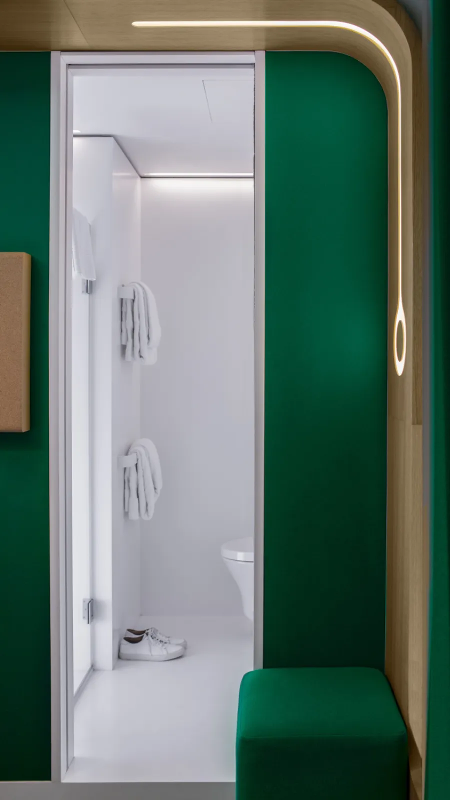Emerald green hallway leading to the shower, ORA-ÏTO design hotel in Paris 1st arrondissement