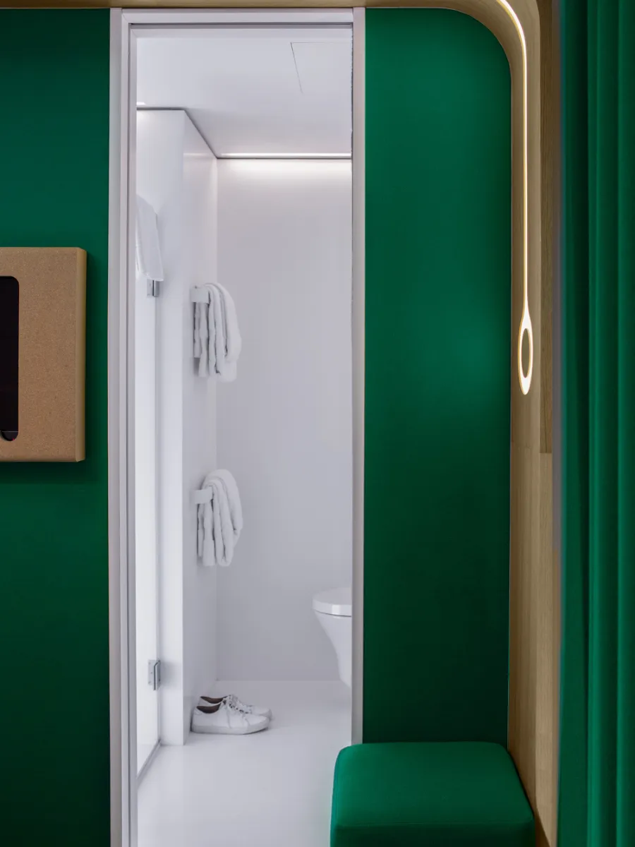 Green entrance to the white shower room, ORA-ÏTO design hotel in Paris 1st arrondissement