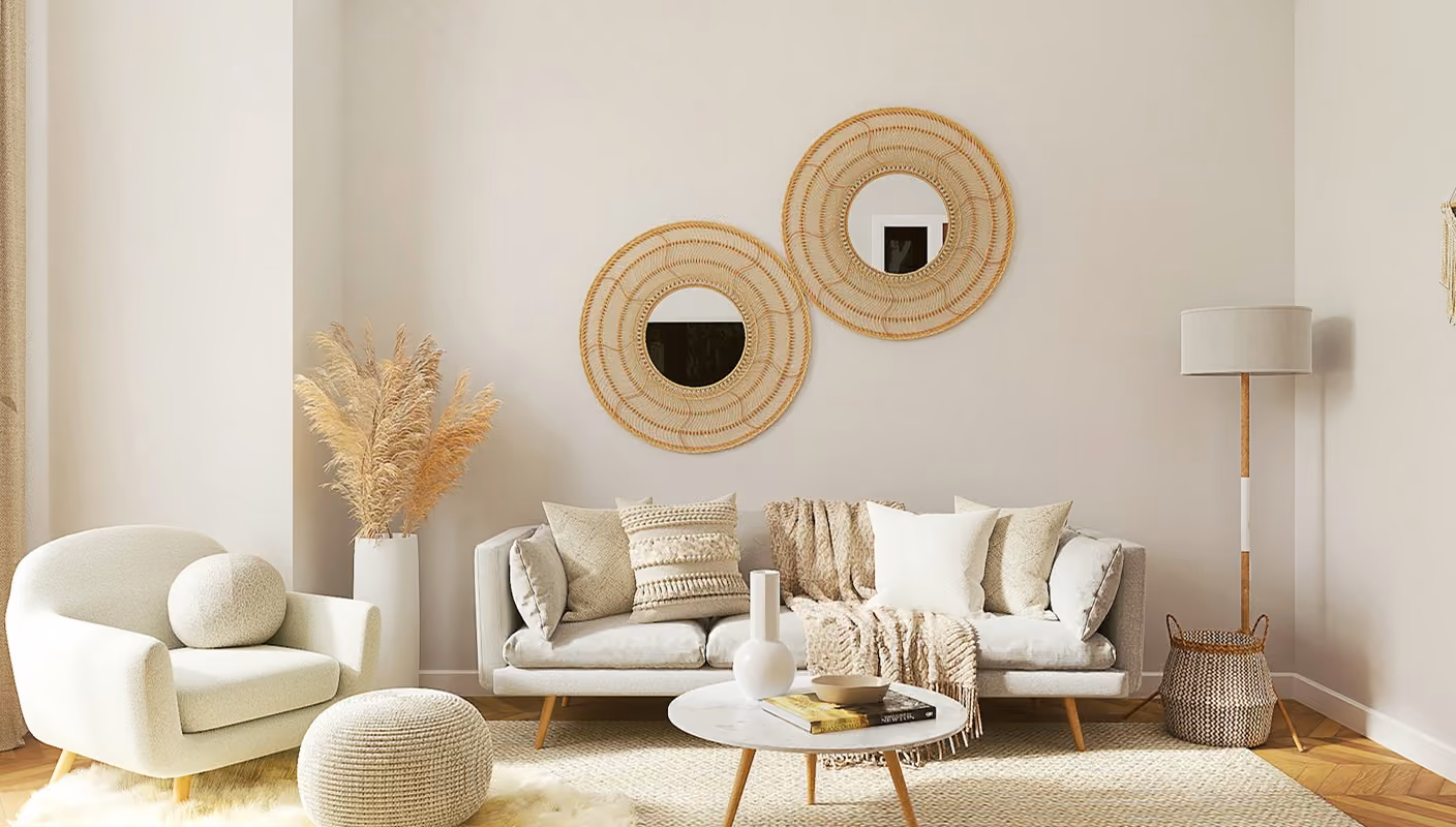 Modern beige living room with sofa, armchair, round mirrors, coffee table, and floor lamp.