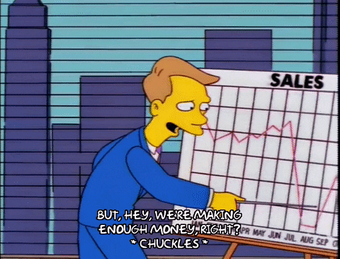 Animated character in blue suit presenting a sales chart with a smiling expression and subtitle text saying, 'BUT, HEY, WE'RE MAKING ENOUGH MONEY, RIGHT? *CHUCKLES*'.