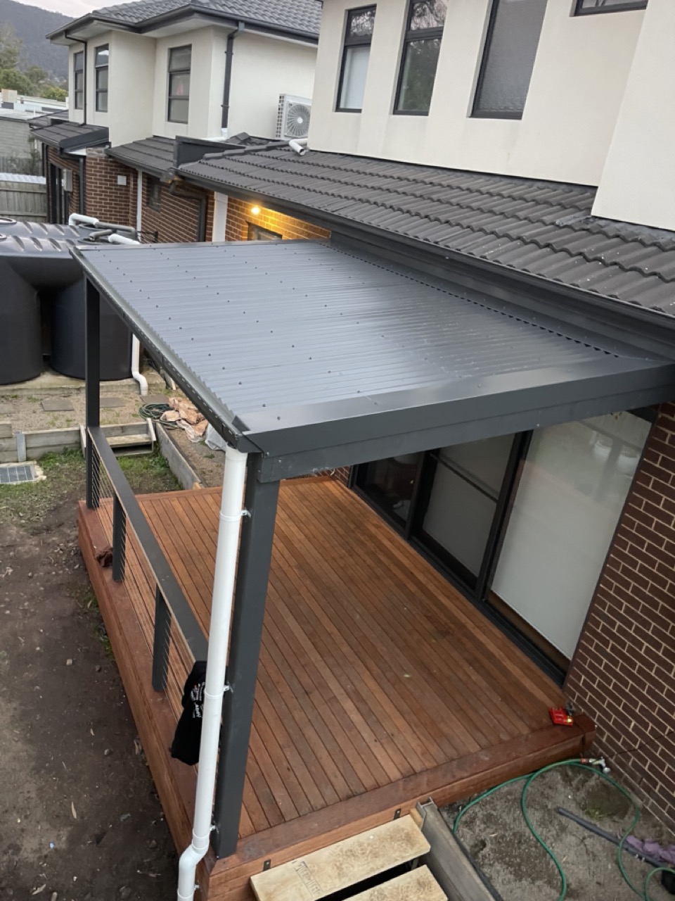 Pergola roof plumbing and guttering installation