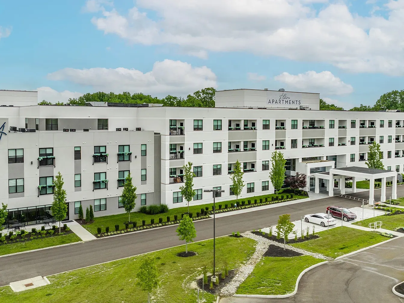 The Altura apartments front entrance with new foundation planting beds and walkways
