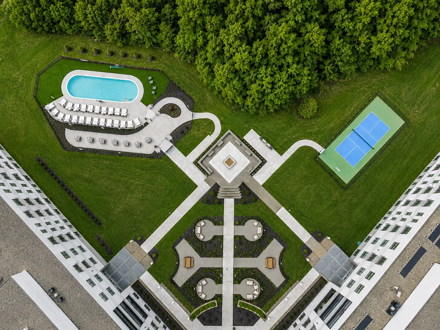 Aerial view of the Altura apartments grounds, pool and courtyard landscape build