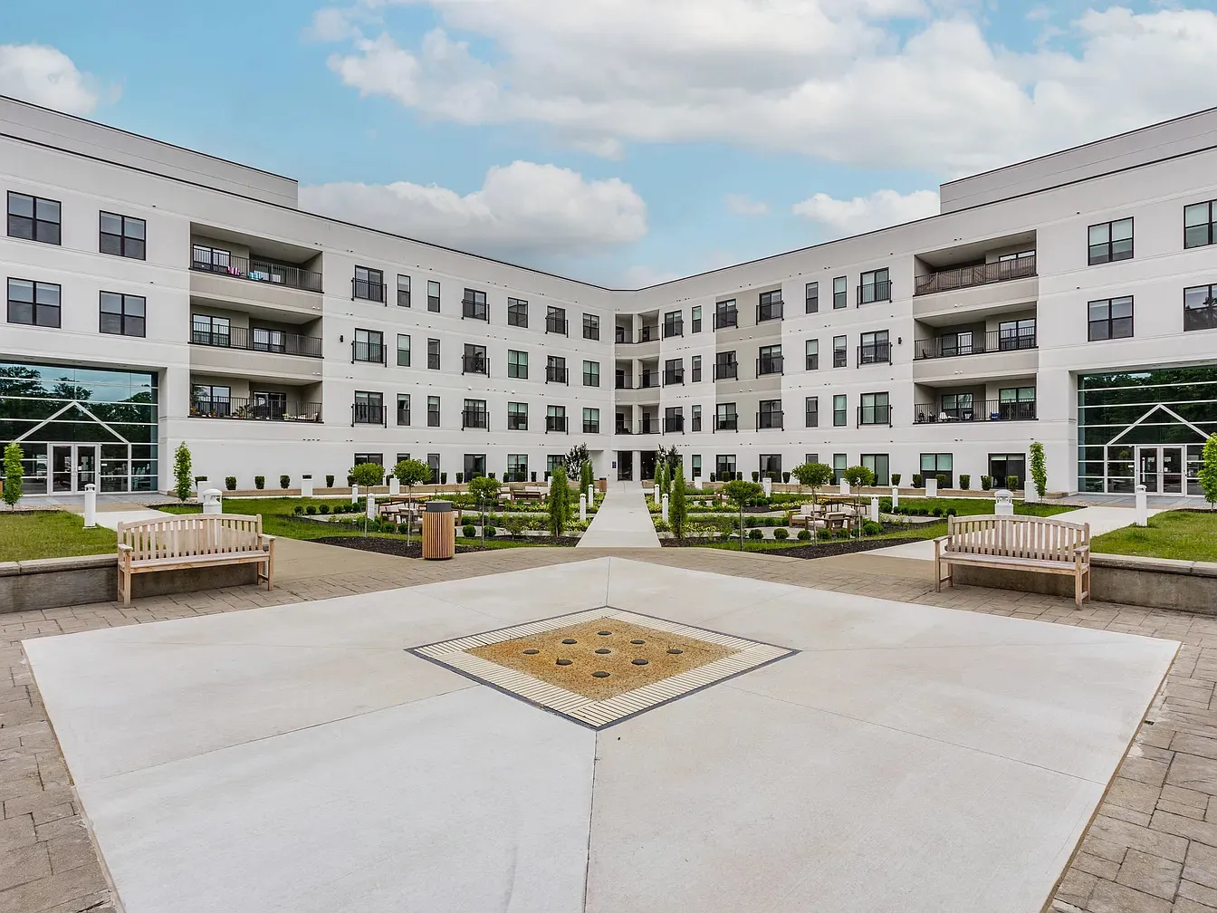 The Altura apartments courtyard: paver plaza, planting beds and walkways built by Landform