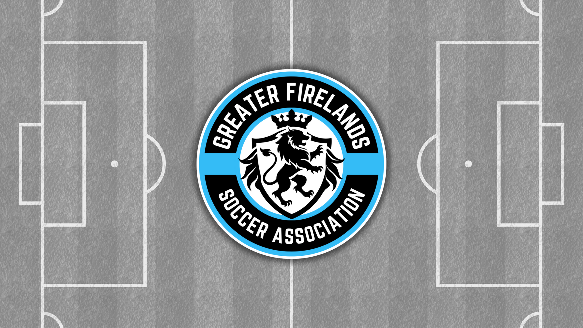 Logo of Greater Firelands Soccer Association featuring a crowned lion silhouette on a shield, encircled by the association's name with blue and black accents, overlaid on a grayscale soccer field.