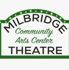 Sign reading 'Milbridge Community Arts Center Theatre' with green border and decorative dots.