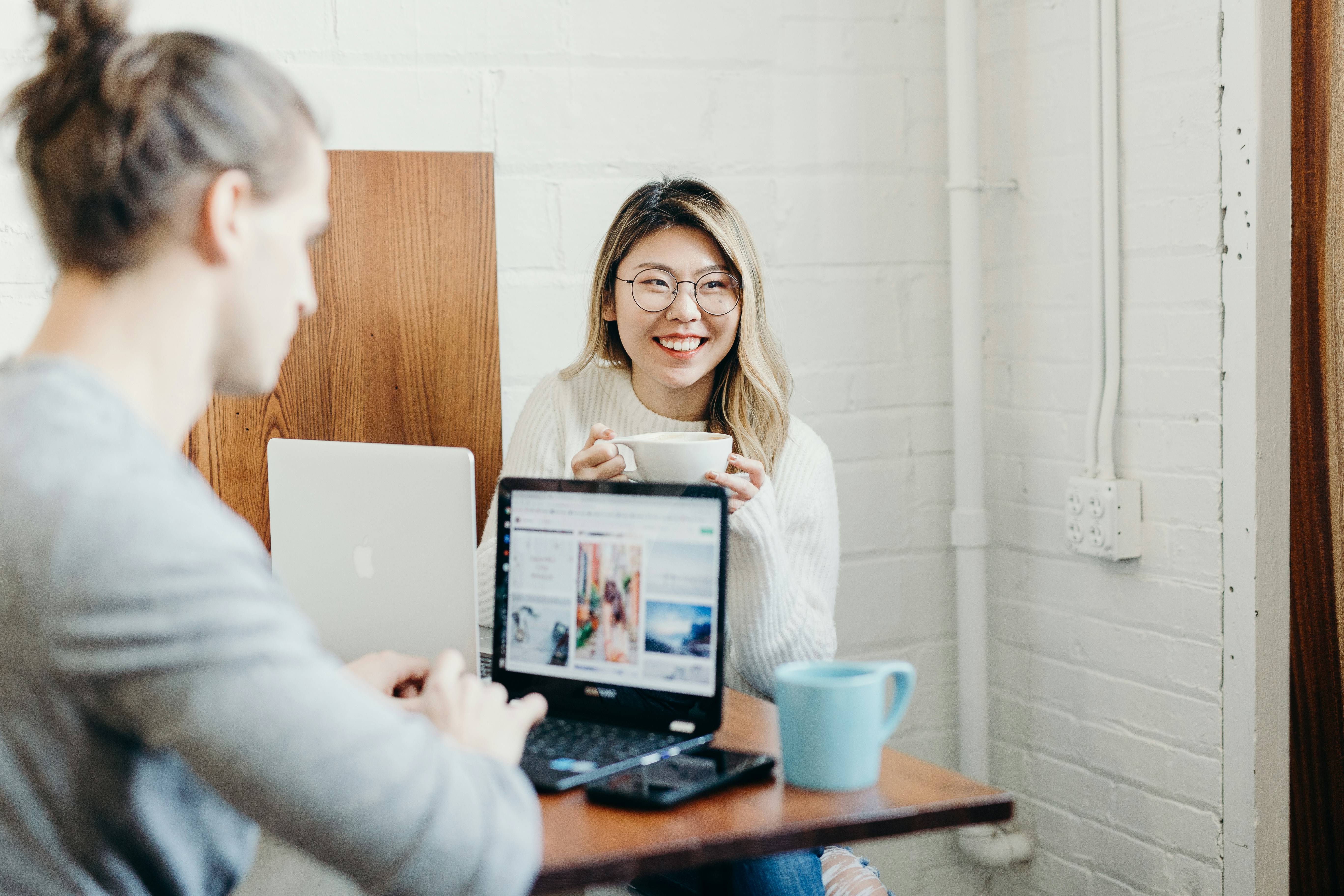 People sitting on computers stock image
