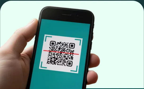 Phone scanning a payment QR code