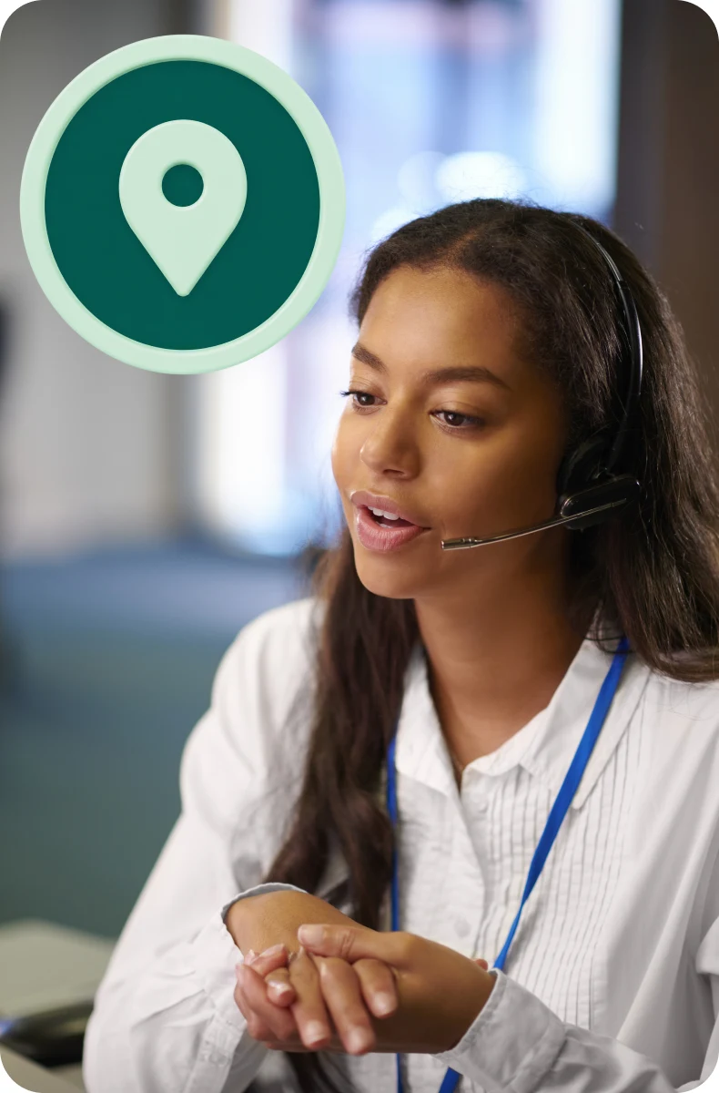Call handler taking a call on a headset