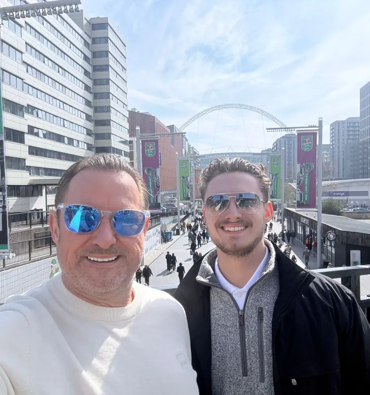 Two CRE customers outside Wembley Stadium