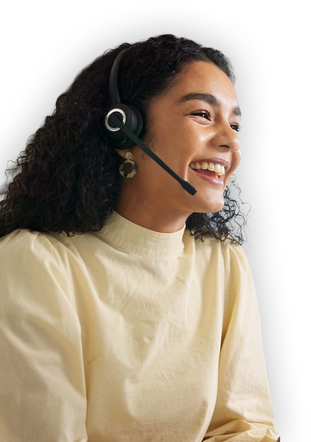 Smiling CRE energy advisor wearing a headset
