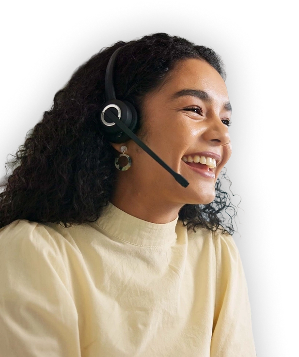 Smiling CRE energy advisor wearing a headset