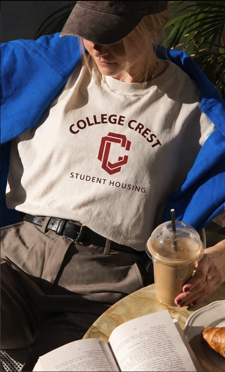 Girl wearing college crest shirt