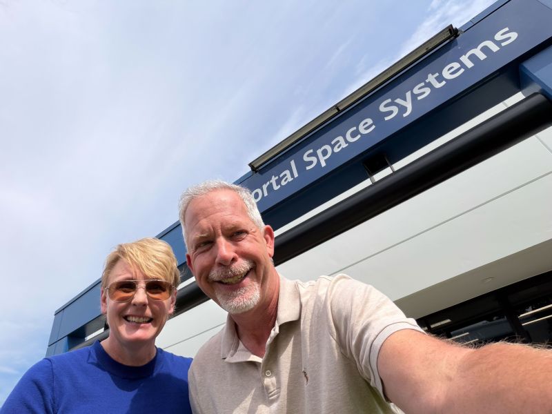Rebel Space Technologies CEO and Co-Founder, Carrie Marshall (left), and Portal Space Systems CEO and Founder, Jeff Thornburg (right), pose together in front of the Portal Space Systems headquarters in Bothell, Washington