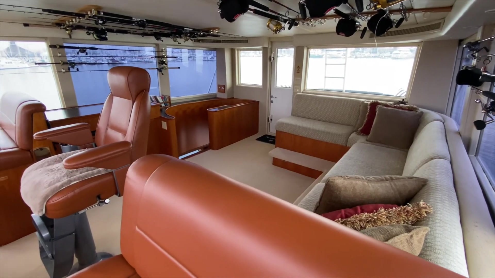 Seating beside the enclosed helm