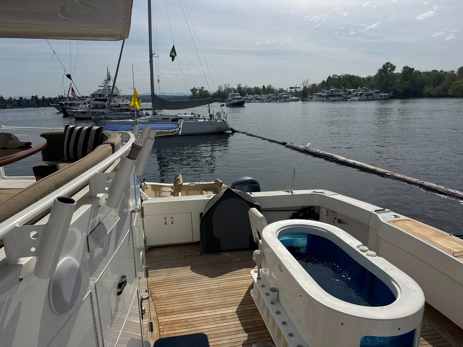 Surfrider cockpit showing the hot tub, teak deck and covered aft seating