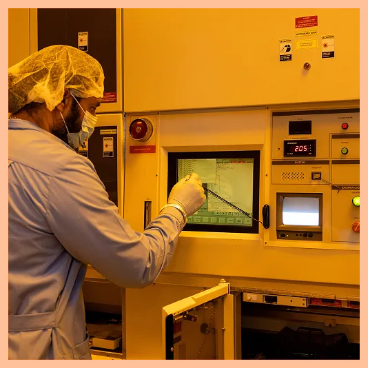 A GCE engineer operating a tool console during commissioning