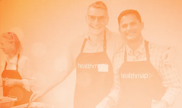 Healthmap team members volunteering at a community meal.