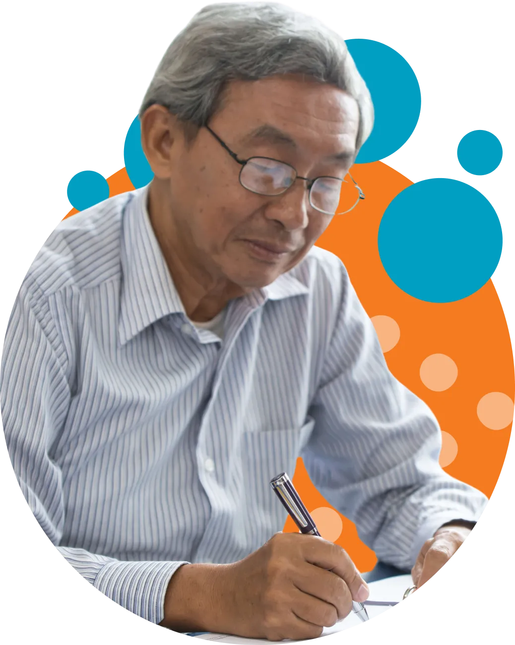 Elderly man with gray hair and glasses writing with a pen on paper, wearing a striped light blue shirt, with abstract orange and blue circular shapes in the background.