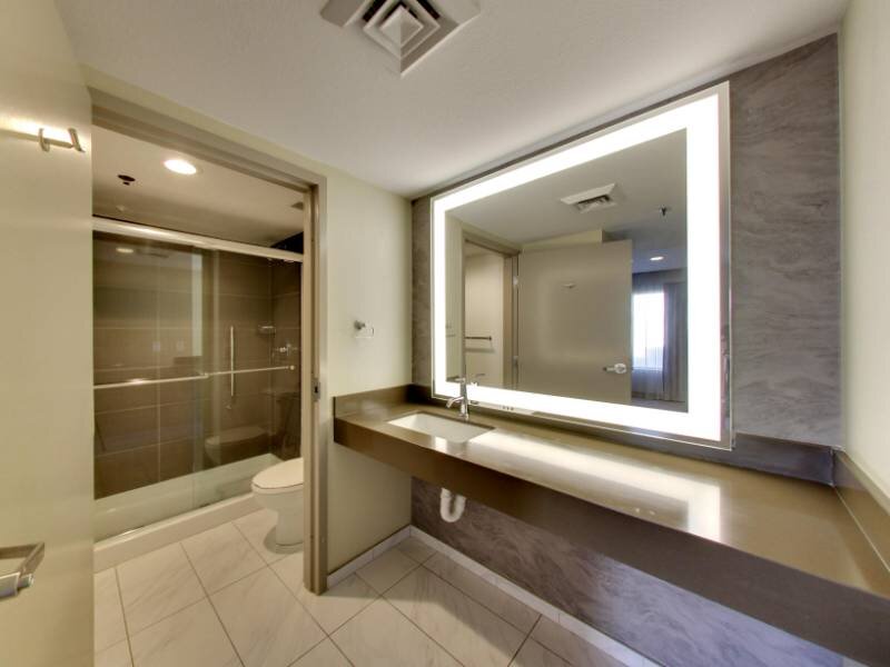 Bathroom with light up vanity 