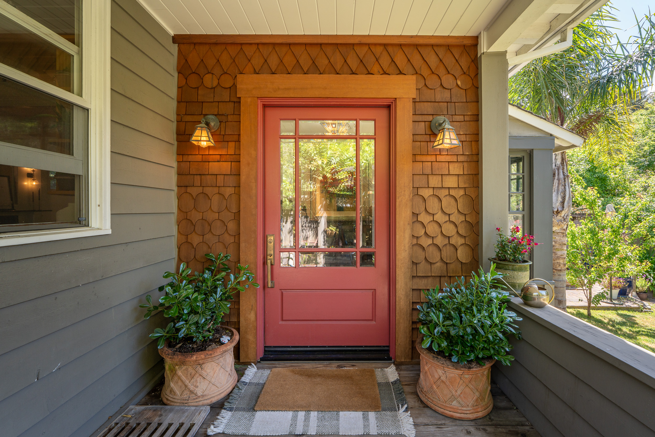 Craftsman front porch with a red door, Marin County