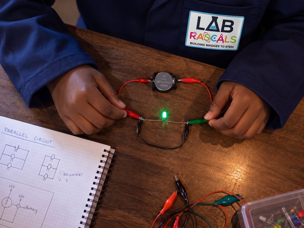 Students building electrical circuits