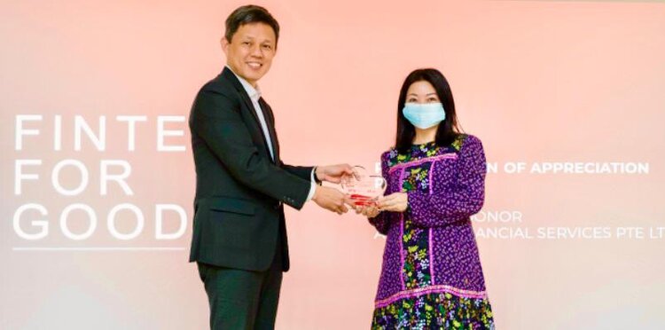 Cathy with Mr Chan Chun Sing at Fintech for Good Charity Event