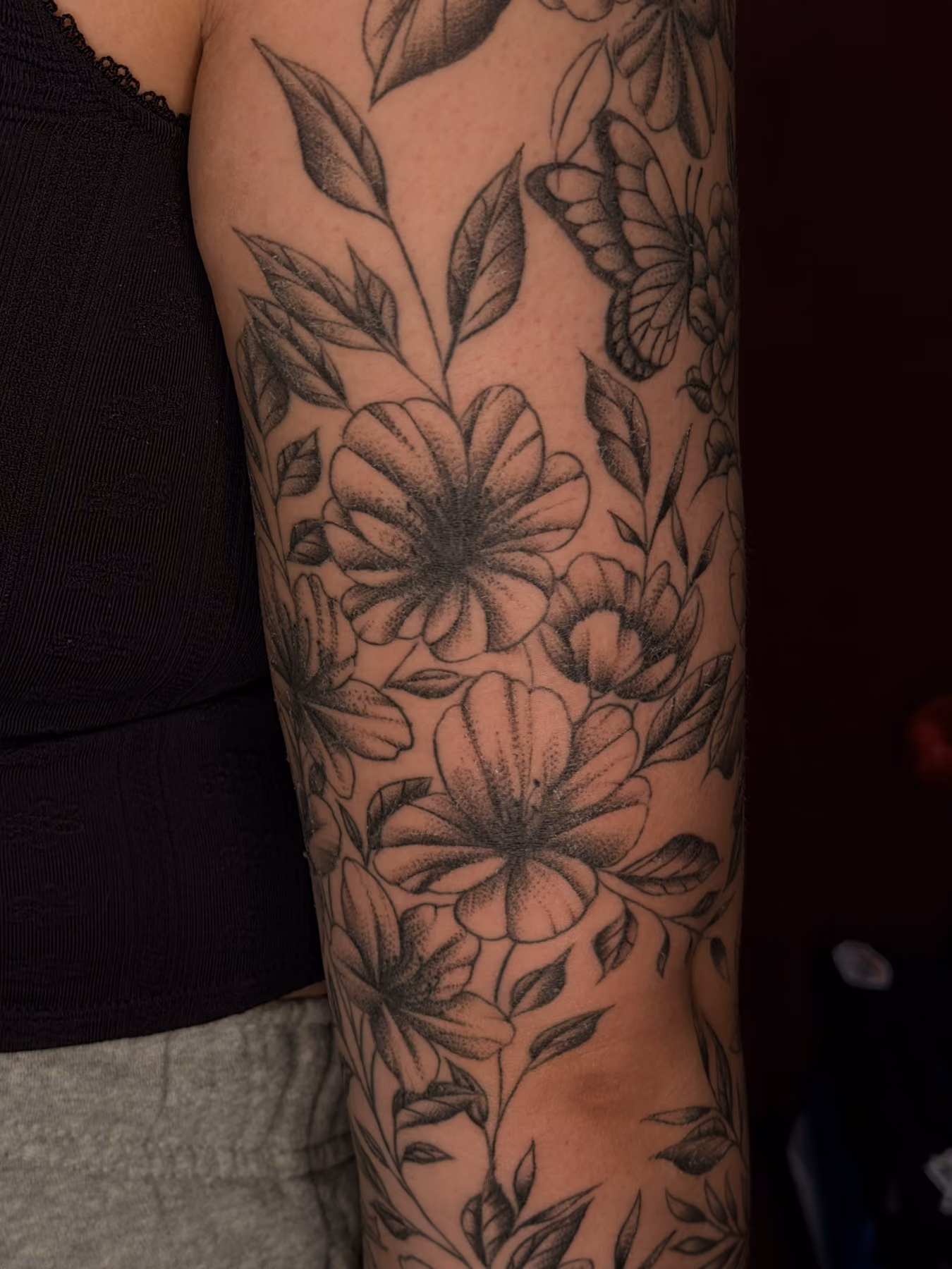 Black and grey floral forearm tattoo, Poughkeepsie NY