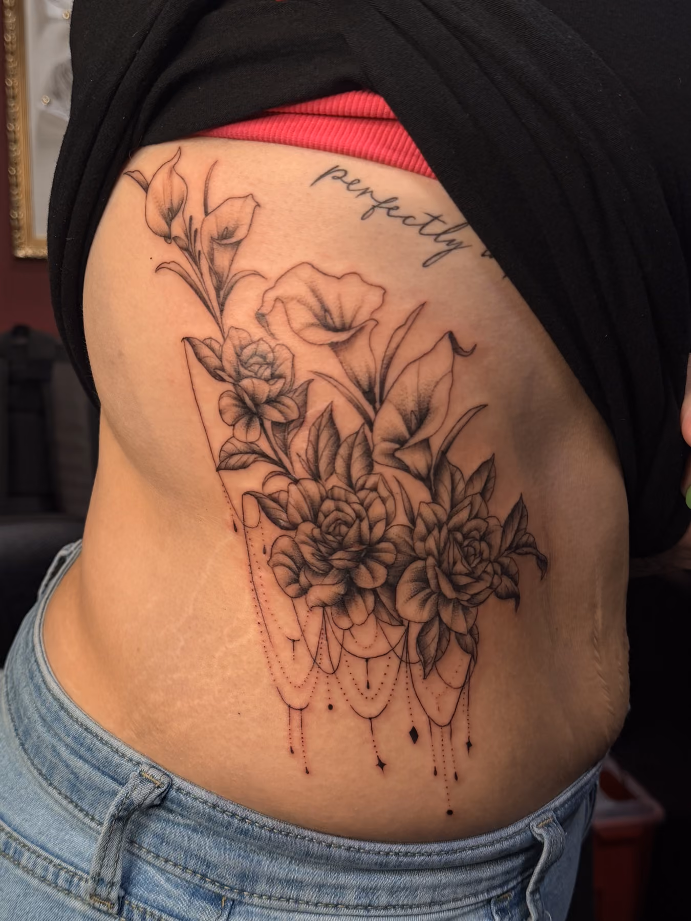 Black and grey peony shoulder tattoo
