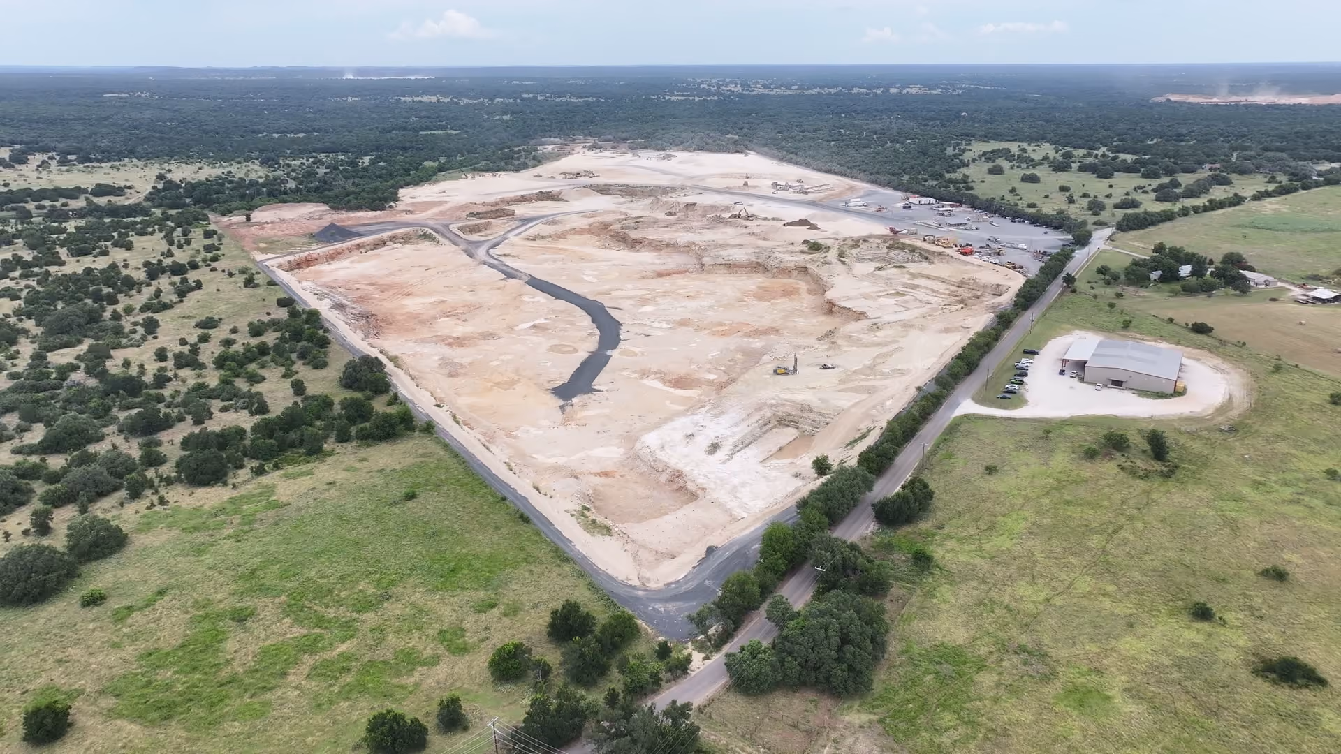 Aerial view of the Heartland Aggregates limestone quarry and plant near Jarrell, Texas