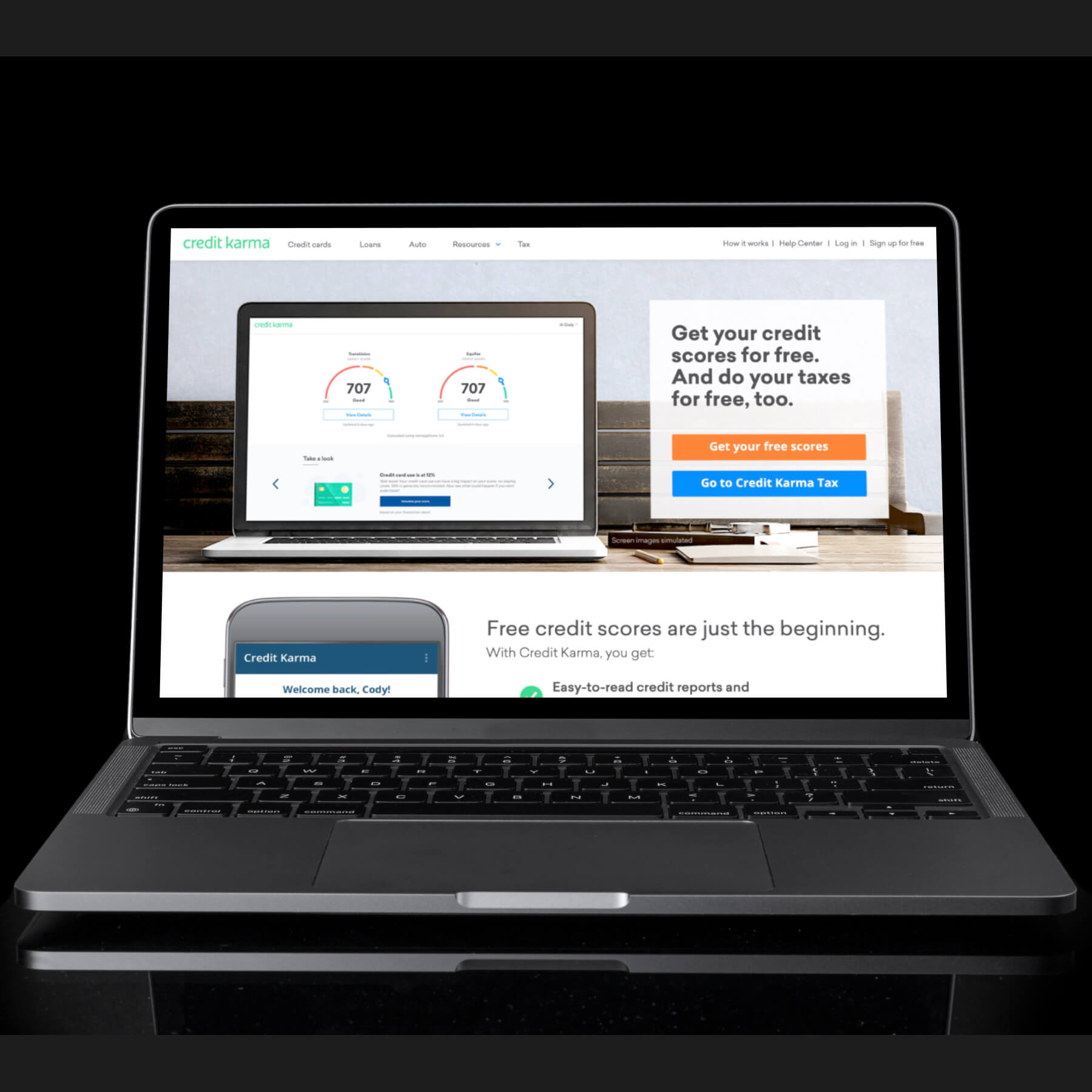 A laptop with the Credit Karma homepage on the screen.