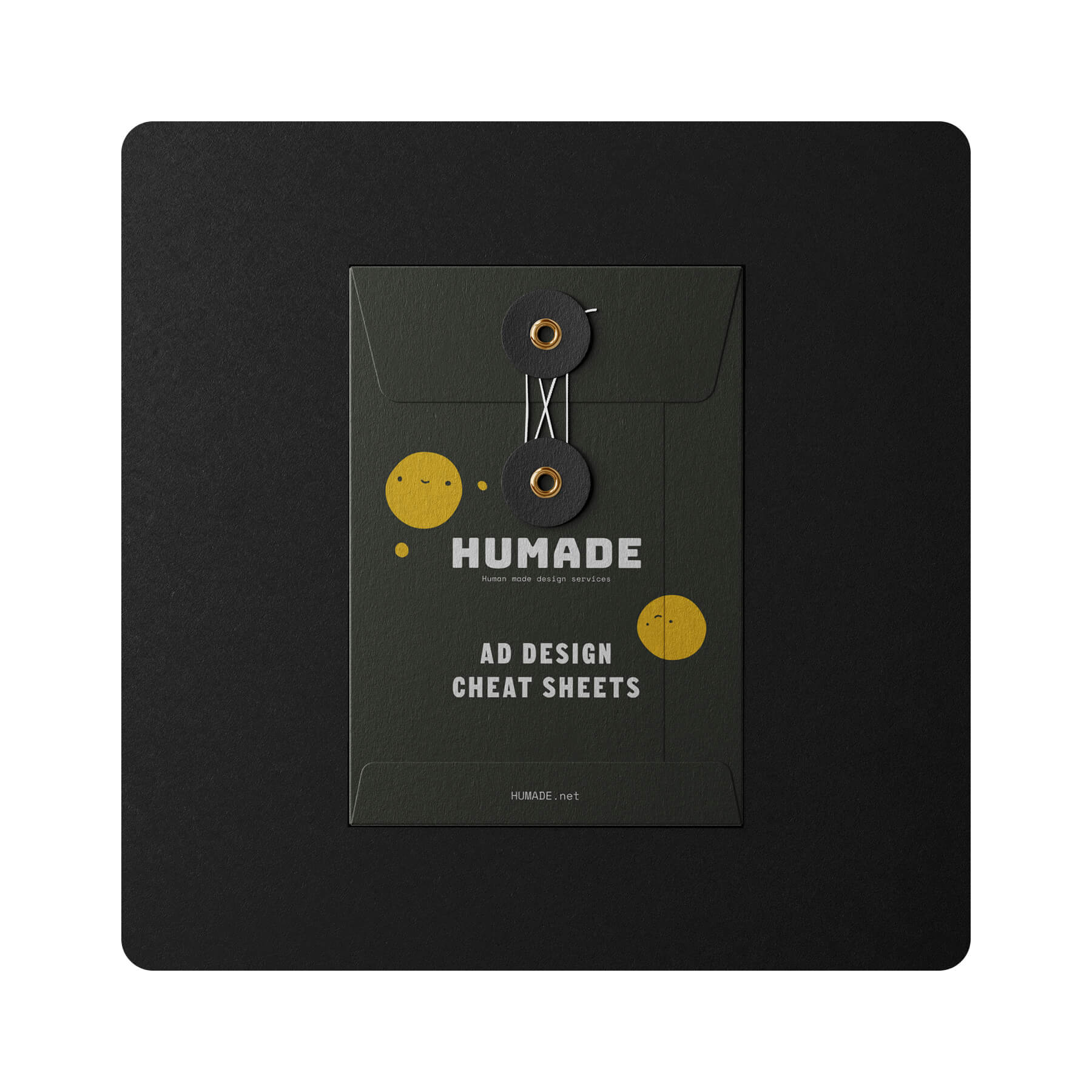 A dark green envelope containing Humade creative resources.